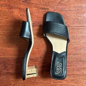Like new. Franco Sarto Black Leather Mules with Minimalist Design